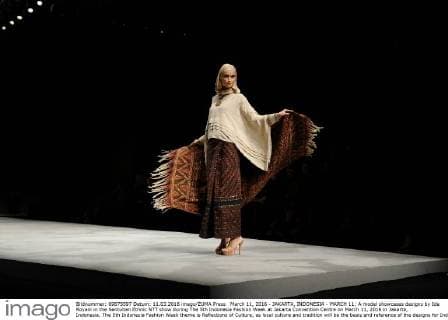 March 11, 2016 - JAKARTA, INDONESIA - MARCH 11: A model showcases designs by Ida Royani in the Sentuhan Ethnic NTT show during The 5th Indonesia Fashion Week at Jakarta Convention Centre on March 11, 2016 in Jakarta, Indonesia. The 5th Indonesia Fashion Week theme is Reflections of Culture, as local culture and tradition will be the basis and reference of the designs for Indonesia fashion design trend that would be able to carve Indonesia identity in the world of fashion that reflects its own culture. Indonesia hopes to become the Paris of Muslim fashion with modern designs in a variety of textures and colors. - ZUMAp112