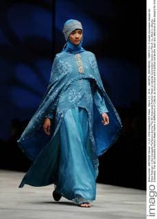 March 11, 2016 - JAKARTA, INDONESIA - MARCH 11: A model showcases designs by Nieta Hidayani in the Donggala Perfection during The 5th Indonesia Fashion Week at Jakarta Convention Centre on March 11, 2016 in Jakarta, Indonesia. The 5th Indonesia Fashion Week theme is Reflections of Culture, as local culture and tradition will be the basis and reference of the designs for Indonesia fashion design trend that would be able to carve Indonesia identity in the world of fashion that reflects its own culture. Indonesia hopes to become the Paris of Muslim fashion with modern designs in a variety of textures and colors. - ZUMAp112