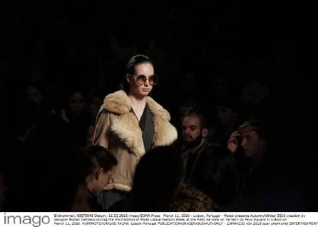 March 11, 2016 - Lisbon, Portugal - Model presents Autumn Winter 2016 creation by designer Ruben Damasio during the 45rd edition of Moda Lisboa Fashion Week at the Patio da Gale on Terreiro do Paco Square in Lisbon on March 11, 2016. NURPHOTO CARLOS PALMA. Lisbon Portugal  - ZUMAn230
