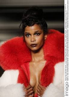 March 11, 2016 - Lisbon, Portugal - Model presents Autumn Winter 2016 creation by designer David Ferreira during the 45rd edition of Moda Lisboa Fashion Week at the Patio da Gale on Terreiro do Paco Square in Lisbon on March 11, 2016. NURPHOTO CARLOS PALMA. Lisbon Portugal  - ZUMAn230
