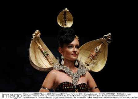 March 11, 2016 - Jakarta, Indonesia - JAKARTA, INDONESIA - MARCH 10: A model showcases designs by Yurita Puji and Julie Laiskodat at the The Touch of Nusa Tenggara Timur show during The 5th Indonesia Fashion Week at Jakarta Convention Centre on March 10, 2016 in Jakarta, Indonesia. The 5th Indonesia Fashion Week theme is Reflections of Culture, as local culture and tradition will be the basis and reference of the designs for Indonesia fashion design trend that would be able to carve Indonesia identity in the world of fashion that reflects its own culture. Indonesia hope to become the central of world design with modern designs in a variety of textures and colors. Jakarta Indonesia - ZUMAp112