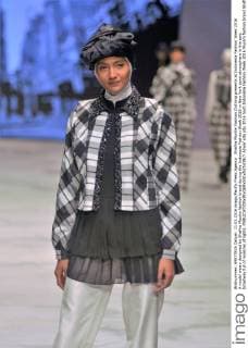 Shafira Muslim Fashion Clothing presents at Indonesia Fashion Week 2016 A model wears designed by Shafira Muslim fashion brand during the Indonesia Fashion Week 2016 in New York town atmosphere in the epic broadway full of nuances of lights.  Azwar