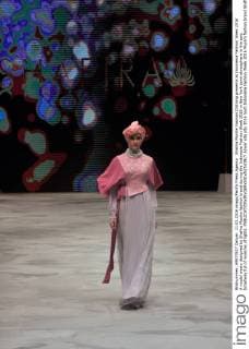 Shafira Muslim Fashion Clothing presents at Indonesia Fashion Week 2016 A model wears designed by Shafira Muslim fashion brand during the Indonesia Fashion Week 2016 in New York town atmosphere in the epic broadway full of nuances of lights.  Azwar