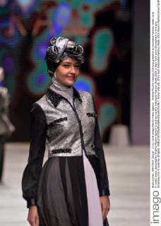 Shafira Muslim Fashion Clothing presents at Indonesia Fashion Week 2016 A model wears designed by Shafira Muslim fashion brand during the Indonesia Fashion Week 2016 in New York town atmosphere in the epic broadway full of nuances of lights.  Azwar
