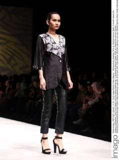 Fashunica by Stephen Tach at Jakarta Fashion Week A model wears the creation of Stephen Tach from Japan with the theme Fashunica , in Indonesia Fashion Week 2016, at Jakarta Convention Center.  NatanaelxPohan