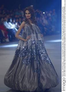 Lahore, PFDC Sunsilk Fashion Week in Pakistan Pakistan: Sunsilk PFDC Fashion Week on its 2nd day Pakistani model presents creations by famous designer ALI XEESHAN on the second day of Pakistan Fashion Design Council (PFDC) Fashion Week.  RanaxSajidxHussain