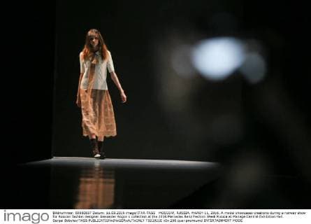 MOSCOW, RUSSIA. MARCH 11, 2016. A model showcases creations during a runway show for Russian fashion designer Alexander Rogov s collection at the 2016 Mercedes Benz Fashion Week Russia at Manege Central Exhibition Hall. Sergei Bobylev TASS  TS01921E