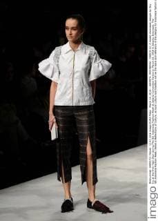 March 12, 2016 - JAKARTA, INDONESIA - MARCH 12: A model showcases designs by Sky Inc at the Over Haul show during The 5th Indonesia Fashion Week at Jakarta Convention Centre on March 12, 2016 in Jakarta, Indonesia. The 5th Indonesia Fashion Week theme is Reflections of Culture, as local culture and tradition will be the basis and reference of the designs for Indonesia fashion design trend that would be able to carve Indonesia identity in the world of fashion that reflects its own culture. Indonesia hope to become the central of world fashion with modern designs in a variety of textures and colors. - ZUMAp112