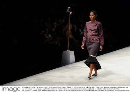 March 12, 2016 - JAKARTA, INDONESIA - MARCH 12: A model showcases designs by Sky Inc at the Over Haul show during The 5th Indonesia Fashion Week at Jakarta Convention Centre on March 12, 2016 in Jakarta, Indonesia. The 5th Indonesia Fashion Week theme is Reflections of Culture, as local culture and tradition will be the basis and reference of the designs for Indonesia fashion design trend that would be able to carve Indonesia identity in the world of fashion that reflects its own culture. Indonesia hope to become the central of world fashion with modern designs in a variety of textures and colors. - ZUMAp112