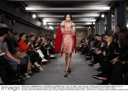 March 12, 2016 - Lisbon, Portugal - Model presents Autumn Winter 2016 creation by designer Carlos Gil during the 45rd edition of Moda Lisboa Fashion Week at the Patio da Gale on Terreiro do Paco Square in Lisbon on March 12, 2016. NURPHOTO CARLOS PALMA. Lisbon Portugal  - ZUMAn230
