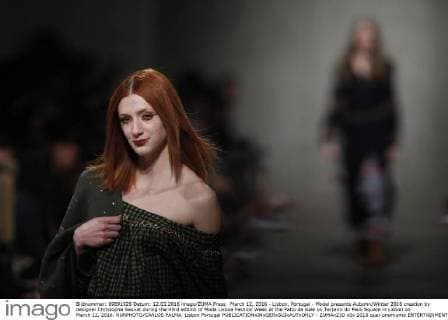 March 12, 2016 - Lisbon, Portugal - Model presents Autumn Winter 2016 creation by designer Christophe Sauvat during the 45rd edition of Moda Lisboa Fashion Week at the Patio da Gale on Terreiro do Paco Square in Lisbon on March 12, 2016. NURPHOTO CARLOS PALMA. Lisbon Portugal  - ZUMAn230
