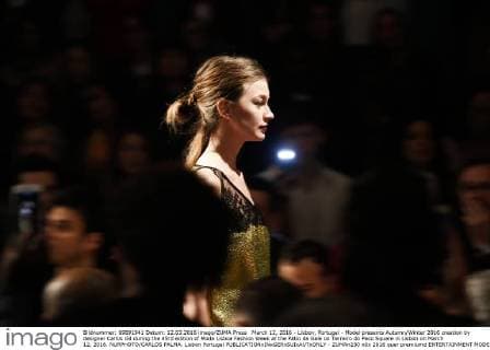 March 12, 2016 - Lisbon, Portugal - Model presents Autumn Winter 2016 creation by designer Carlos Gil during the 45rd edition of Moda Lisboa Fashion Week at the Patio da Gale on Terreiro do Paco Square in Lisbon on March 12, 2016. NURPHOTO CARLOS PALMA. Lisbon Portugal  - ZUMAn230