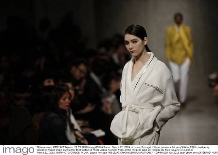 March 12, 2016 - Lisbon, Portugal - Model presents Autumn Winter 2016 creation by designer Miguel Vieira during the 45rd edition of Moda Lisboa Fashion Week at the Patio da Gale on Terreiro do Paco Square in Lisbon on March 12, 2016. NURPHOTO CARLOS PALMA. Lisbon Portugal  - ZUMAn230