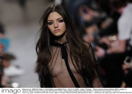 March 12, 2016 - Lisbon, Portugal - Model presents Autumn Winter 2016 creation by designer Alexandra Moura during the 45rd edition of Moda Lisboa Fashion Week at the Patio da Gale on Terreiro do Paco Square in Lisbon on March 12, 2016. NURPHOTO CARLOS PALMA. Lisbon Portugal  - ZUMAn230