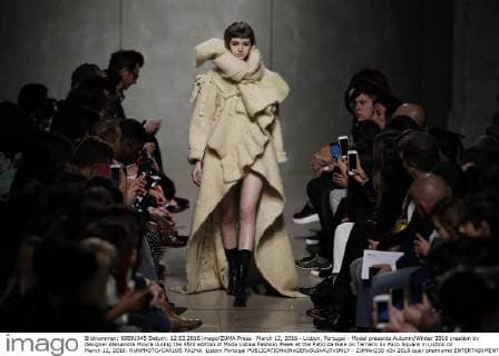 March 12, 2016 - Lisbon, Portugal - Model presents Autumn Winter 2016 creation by designer Alexandra Moura during the 45rd edition of Moda Lisboa Fashion Week at the Patio da Gale on Terreiro do Paco Square in Lisbon on March 12, 2016. NURPHOTO CARLOS PALMA. Lisbon Portugal  - ZUMAn230