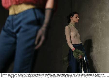 March 12, 2016 - Lisbon, Portugal - Model presents Autumn Winter 2016 creation by designer Carlos Gil during the 45rd edition of Moda Lisboa Fashion Week at the Patio da Gale on Terreiro do Paco Square in Lisbon on March 12, 2016. NURPHOTO CARLOS PALMA. Lisbon Portugal  - ZUMAn230