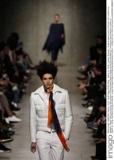 March 12, 2016 - Lisbon, Portugal - Model presents Autumn Winter 2016 creation by designer Miguel Vieira during the 45rd edition of Moda Lisboa Fashion Week at the Patio da Gale on Terreiro do Paco Square in Lisbon on March 12, 2016. NURPHOTO CARLOS PALMA. Lisbon Portugal  - ZUMAn230