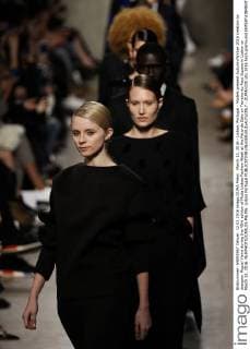 March 12, 2016 - Lisbon, Portugal - Models present Autumn Winter 2016 creation by designer Miguel Vieira during the 45rd edition of Moda Lisboa Fashion Week at the Patio da Gale on Terreiro do Paco Square in Lisbon on March 12, 2016. NURPHOTO CARLOS PALMA. Lisbon Portugal  - ZUMAn230
