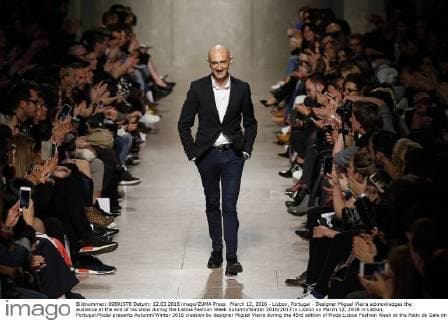March 12, 2016 - Lisbon, Portugal - Designer Miguel Vieira acknowledges the audience at the end of his show during the Lisboa Fashion Week Autumn Winter 2016 2017 in Lisbon on March 12, 2016 in Lisbon, Portugal.Model presents Autumn Winter 2016 creation by designer Miguel Vieira during the 45rd edition of Moda Lisboa Fashion Week at the Patio da Gale on Terreiro do Paco Square in Lisbon on March 12, 2016. NURPHOTO CARLOS PALMA. Lisbon Portugal  - ZUMAn230