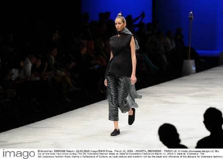 March 12, 2016 - JAKARTA, INDONESIA - MARCH 12: A model showcases designs by Sky Inc at the Over Haul show during The 5th Indonesia Fashion Week at Jakarta Convention Centre on March 12, 2016 in Jakarta, Indonesia. The 5th Indonesia Fashion Week theme is Reflections of Culture, as local culture and tradition will be the basis and reference of the designs for Indonesia fashion design trend that would be able to carve Indonesia identity in the world of fashion that reflects its own culture. Indonesia hope to become the central of world fashion with modern designs in a variety of textures and colors. - ZUMAp112