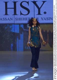 Pakistan: PFDC sunsilk fashion week in Lahore Pakistani model presents creations by famous designer HSY on the third day of Pakistan Fashion Design Council (PFDC) Sunsilk Fashion Week 2016.  RanaxSajidxHussain