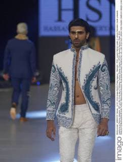 Pakistan: PFDC sunsilk fashion week in Lahore Pakistani model presents creations by famous designer HSY on the third day of Pakistan Fashion Design Council (PFDC) Sunsilk Fashion Week 2016.  RanaxSajidxHussain