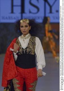 Pakistan: PFDC sunsilk fashion week in Lahore Pakistani model presents creations by famous designer HSY on the third day of Pakistan Fashion Design Council (PFDC) Sunsilk Fashion Week 2016.  RanaxSajidxHussain