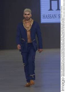 Pakistan: PFDC sunsilk fashion week in Lahore Pakistani model presents creations by famous designer HSY on the third day of Pakistan Fashion Design Council (PFDC) Sunsilk Fashion Week 2016.  RanaxSajidxHussain