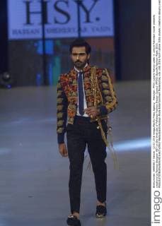 Pakistan: PFDC sunsilk fashion week in Lahore Pakistani model presents creations by famous designer HSY on the third day of Pakistan Fashion Design Council (PFDC) Sunsilk Fashion Week 2016.  RanaxSajidxHussain