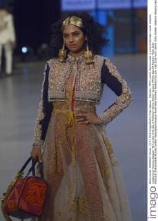 Pakistan: PFDC sunsilk fashion week in Lahore Pakistani model presents creations by famous designer HSY on the third day of Pakistan Fashion Design Council (PFDC) Sunsilk Fashion Week 2016.  RanaxSajidxHussain