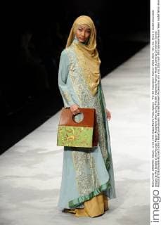 The 5th Indonesian Fashion Week 2016 - Sky Inc. Show A model showcases designs by Ria Baraba at the Panutan Ragam Nusantara show during The 5th Indonesia Fashion Week at Jakarta Convention Centre.  RobertusxPudyanto