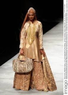The 5th Indonesian Fashion Week 2016 - Sky Inc. Show A model showcases designs by Ria Baraba at the Panutan Ragam Nusantara show during The 5th Indonesia Fashion Week at Jakarta Convention Centre.  RobertusxPudyanto