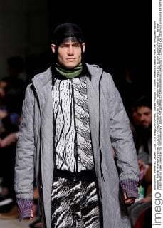 Lisbon, Portugal - A model presents a creation from the Portuguese fashion designer Ricardo Andrez Fall Winter 2016 2017 collection during the Lisbon Fashion Week on March 11, 2016 in Lisbon, Portugal. This year Lisbon Fashion Week celebrates the 25th anniversary. Lisbon Portugal - ZUMAf123