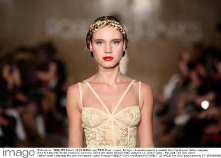 Lisbon, Portugal - A model presents a creation from the Angolan fashion designer Rose Palhares Fall Winter 2016 2017 collection during the Lisbon Fashion Week on March 11, 2016 in Lisbon, Portugal. This year Lisbon Fashion Week celebrates the 25th anniversary. Lisbon Portugal - ZUMAf123