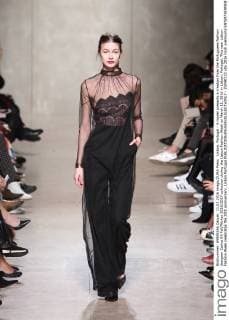 Lisbon, Portugal - A model presents a creation from the Portuguese fashion designer Carlos Gil Fall Winter 2016 2017 collection during the Lisbon Fashion Week on March 11, 2016 in Lisbon, Portugal. This year Lisbon Fashion Week celebrates the 25th anniversary. Lisbon Portugal - ZUMAf123