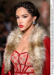 Lisbon, Portugal - A model presents a creation from the Angolan fashion designer Rose Palhares Fall Winter 2016 2017 collection during the Lisbon Fashion Week on March 11, 2016 in Lisbon, Portugal. This year Lisbon Fashion Week celebrates the 25th anniversary. Lisbon Portugal  - ZUMAn230