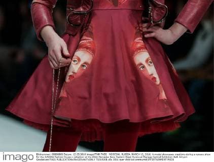 MOSCOW, RUSSIA. MARCH 12, 2016. A model showcases creations during a runway show for the JUNONA Fashion House s collection at the 2016 Mercedes Benz Fashion Week Russia at Manege Central Exhibition Hall. Artyom Geodakyan TASS  TS01930B