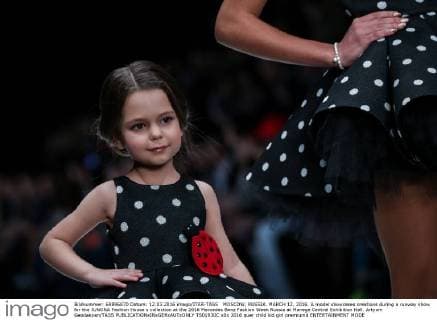 MOSCOW, RUSSIA. MARCH 12, 2016. A model showcases creations during a runway show for the JUNONA Fashion House s collection at the 2016 Mercedes Benz Fashion Week Russia at Manege Central Exhibition Hall. Artyom Geodakyan TASS  TS01930C