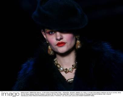 MOSCOW, RUSSIA. MARCH 12, 2016. A model showcases creations during a runway show for the Slava Zaitsev Fashion House s collection at the 2016 Mercedes Benz Fashion Week Russia at Manege Central Exhibition Hall. Artyom Geodakyan TASS  TS019327