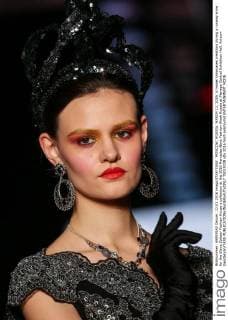 MOSCOW, RUSSIA. MARCH 12, 2016. A model showcases creations during a runway show for the Slava Zaitsev Fashion House s collection at the 2016 Mercedes Benz Fashion Week Russia at Manege Central Exhibition Hall. Artyom Geodakyan TASS  TS019338