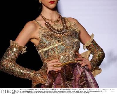 MOSCOW, RUSSIA. MARCH 12, 2016. A model showcases creations during a runway show for the Slava Zaitsev Fashion House s collection at the 2016 Mercedes Benz Fashion Week Russia at Manege Central Exhibition Hall. Artyom Geodakyan TASS  TS01933F