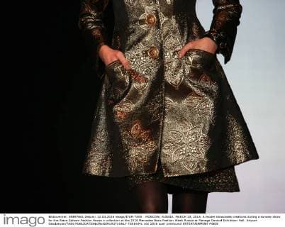 MOSCOW, RUSSIA. MARCH 12, 2016. A model showcases creations during a runway show for the Slava Zaitsev Fashion House s collection at the 2016 Mercedes Benz Fashion Week Russia at Manege Central Exhibition Hall. Artyom Geodakyan TASS  TS019341