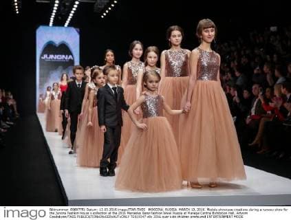 MOSCOW, RUSSIA. MARCH 12, 2016. Models showcase creations during a runway show for the Junona Fashion House s collection at the 2016 Mercedes Benz Fashion Week Russia at Manege Central Exhibition Hall. Artyom Geodakyan TASS  TS019347