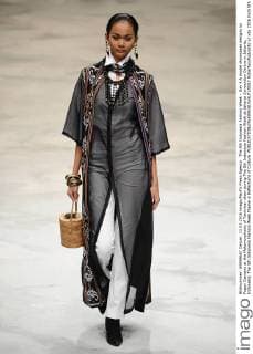 The 5th Indonesia Fashion Week - Day 4 A model showcases designs by Poppy Darsono at the Metamorphosis of Tanimbar show during The 5th Indonesia Fashion Week at Jakarta Convention Centre in Jakarta, Indonesia. The 5th Indonesia Fashion Week theme is Reflections of Culture.  RobertusxPudyanto