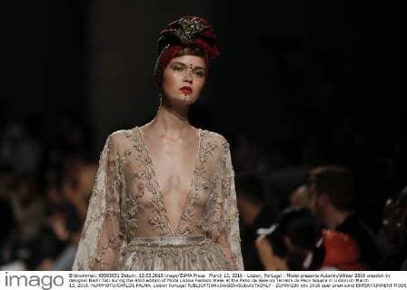 March 13, 2016 - Lisbon, Portugal - Model presents Autumn Winter 2016 creation by designer Nadir Tati during the 45rd edition of Moda Lisboa Fashion Week at the Patio da Gale on Terreiro do Paco Square in Lisbon on March 13, 2016. NURPHOTO CARLOS PALMA. Lisbon Portugal  - ZUMAn230