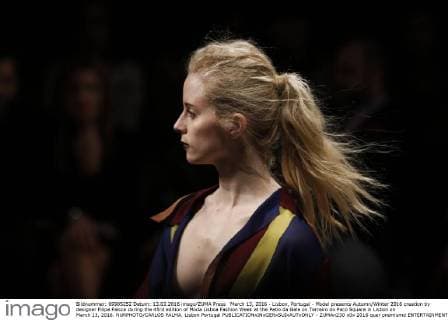 March 13, 2016 - Lisbon, Portugal - Model presents Autumn Winter 2016 creation by designer Filipe Faisca during the 45rd edition of Moda Lisboa Fashion Week at the Patio da Gale on Terreiro do Paco Square in Lisbon on March 13, 2016. NURPHOTO CARLOS PALMA. Lisbon Portugal  - ZUMAn230