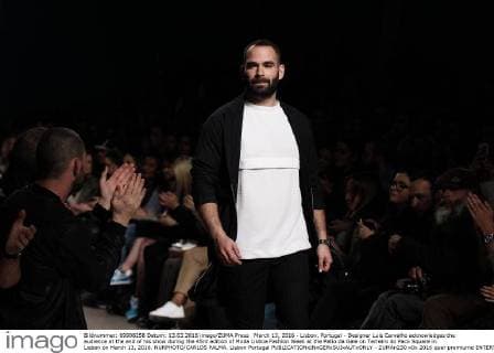 March 13, 2016 - Lisbon, Portugal - Designer Luis Carvalho acknowledges the audience at the end of his show during the 45rd edition of Moda Lisboa Fashion Week at the Patio da Gale on Terreiro do Paco Square in Lisbon on March 13, 2016. NURPHOTO CARLOS PALMA. Lisbon Portugal  - ZUMAn230