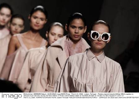 March 13, 2016 - Lisbon, Portugal - Models present Autumn Winter 2016 creation by designer Luis Carvalho during the 45rd edition of Moda Lisboa Fashion Week at the Patio da Gale on Terreiro do Paco Square in Lisbon on March 13, 2016. NURPHOTO CARLOS PALMA. Lisbon Portugal  - ZUMAn230