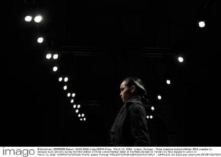 March 13, 2016 - Lisbon, Portugal - Model presents Autumn Winter 2016 creation by designer Luis Carvalho during the 45rd edition of Moda Lisboa Fashion Week at the Patio da Gale on Terreiro do Paco Square in Lisbon on March 13, 2016. NURPHOTO CARLOS PALMA. Lisbon Portugal  - ZUMAn230