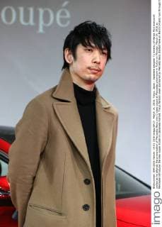 March 14, 2016, Tokyo, Japan - Japanese designer Yu Amatsu of Hanae Mori manuscrit smiles as he attends the presentation of Mercedes-Benz new C-class coupe at Mercedes showroom in Tokyo on Monday, March 14, 2016 as Mercedes introduces the new coupe model on Japanese market. Tokyo fashion week sponsored by Merceds Benz started here on March 14 and runs through to the 19th.  (lwxa000290)